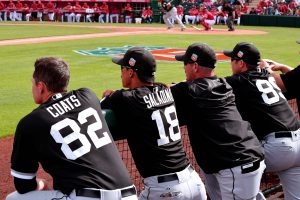 Angels watch from dugout 1