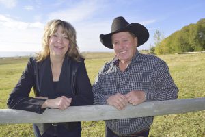 terri-and-marvin-lean-on-fence-1